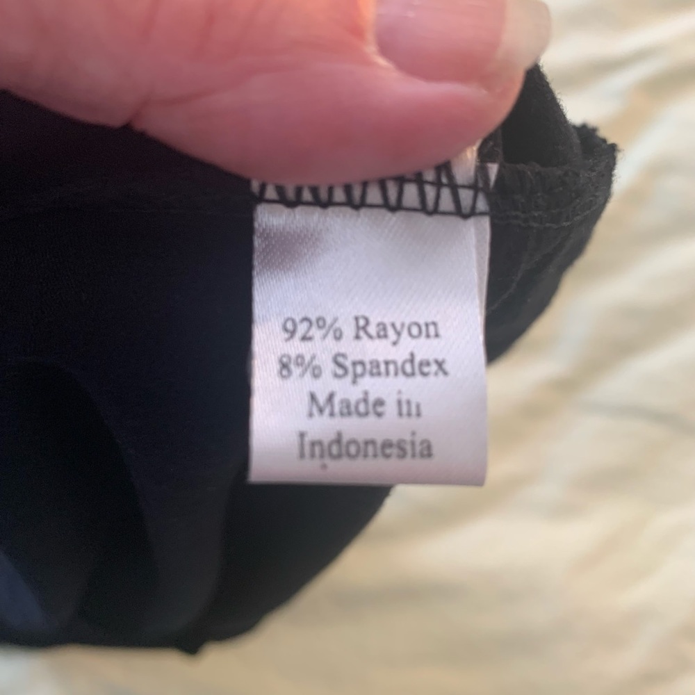 Black strapless smocked flowy top. Size medium. - Picture 12 of 13